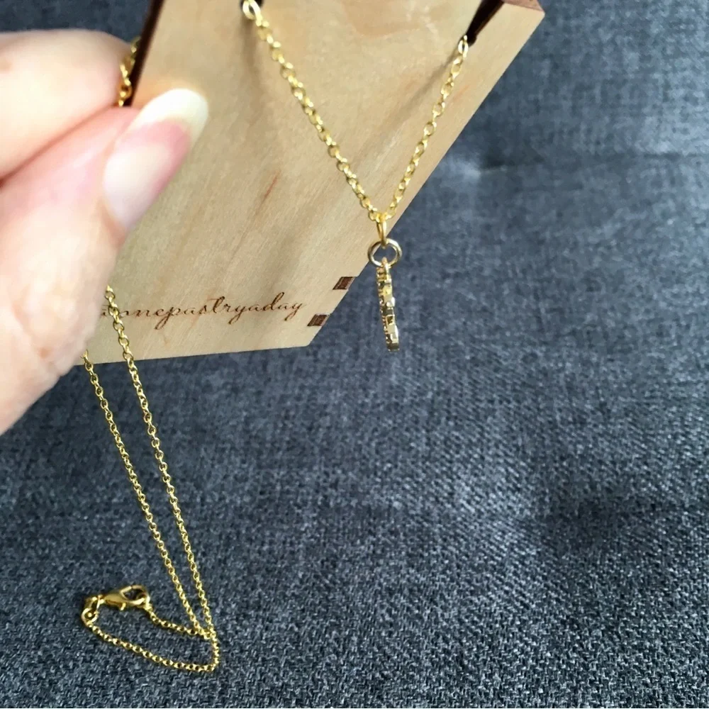 Cubic Zirconia Micro Pave + Gold Dollar Sign Fashion Necklace, 18 inches